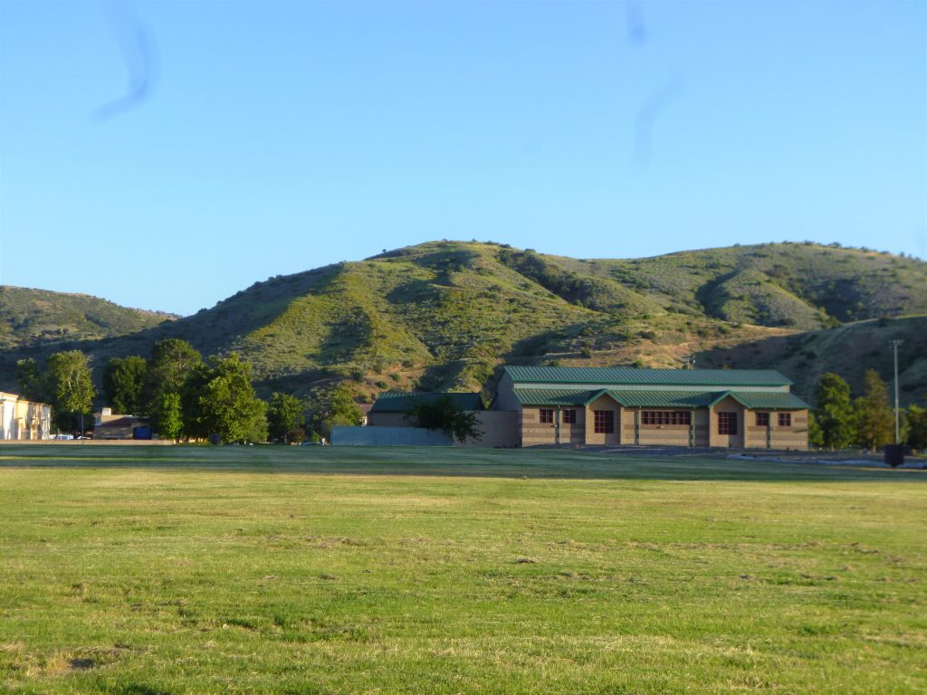 Green southern hills on an early evening walk